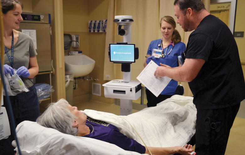 Ed Staff Work With Telestroke Neurologist To Perform A Nihss During A “ Code Stroke” Photo Credit Wendy Fagan Prmce Media Optimized